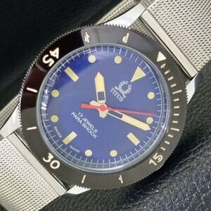 Vintage 1975 Titus Manual Mens Silver Watch W/Steel Strap & Blue accents